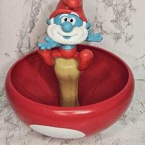 Charming Red Decorative Bowl with Blue Figurine